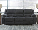Draycoll Reclining Sofa - Furniture Center (NY)