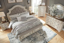 Realyn Upholstered Bed - Furniture Center (NY)