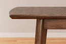 Lyncott Dining Extension Table - Furniture Center (NY)
