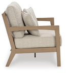 Hallow Creek Outdoor Loveseat with Cushion - Furniture Center (NY)