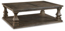 Johnelle Coffee Table - Furniture Center (NY)